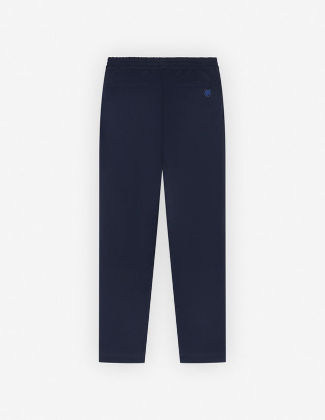 CITY PANTS IN COTTON GABARDINE WITH BOLD FOX HEAD PATCH - INK BLUE LM01111WW0085 INK BLUE Maison Kitsune 
